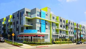 Los Angeles apartment for rent - a new apartment building on a city street with cars