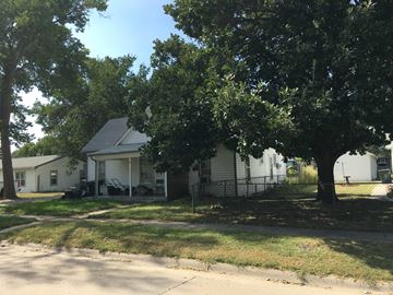 Kearney apartment for rent - a white house with a tree in front of it
