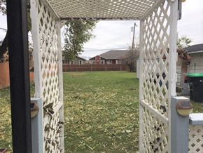 Brandon house for rent - a backyard with a white gazebo and a yard