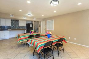 Dallas apartment for rent - A dining room with a table set for a meal.
