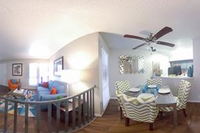 Dallas apartment for rent - A dining room with a table set for four.