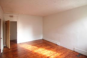 Pittsburgh apartment for rent - an empty room with wooden floors and white walls
