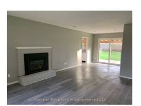 West Linn apartment for rent - an empty living room with a fireplace