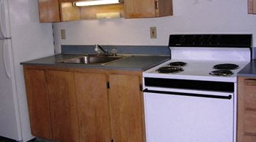 Portland apartment for rent - A kitchen with a stove and sink.