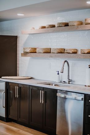 Hickory apartment for rent - a kitchen with stainless steel cabinets and a sink and counter top