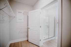 Hickory apartment for rent - a closet in a bedroom with a door to a shower
