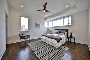 Philadelphia apartment for rent - a bedroom with a bed and a ceiling fan