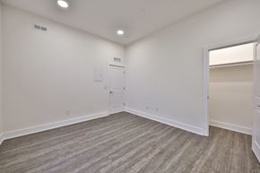 Philadelphia apartment for rent - an empty living room with white walls and a door to a closet