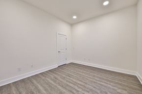 Philadelphia apartment for rent - an empty living room with white walls and a white door