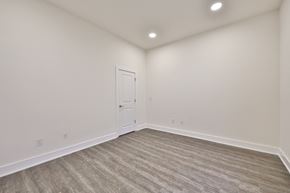 Philadelphia apartment for rent - an empty living room with white walls and a white door