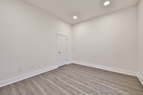 Philadelphia apartment for rent - an empty living room with white walls and a white door