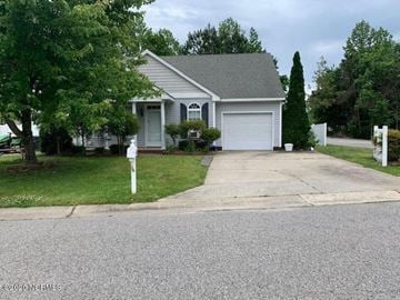 Rocky Mount house for rent - a house with a driveway and a parking meter