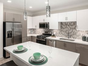 Tempe apartment for rent - Model kitchen with white cabinets at Norte Town Lake Apartments in Tempe Arizona