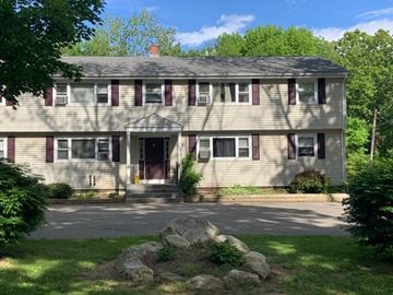 Hebron apartment for rent - a house with a gravel driveway and trees in the