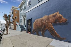 San Francisco apartment for rent - A large bear mural on the side of a building.