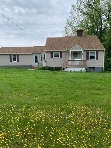 Bolton house for rent - a white house with a yard in front of it