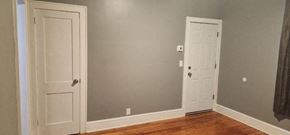 Manchester apartment for rent - an empty room with a door and a closet