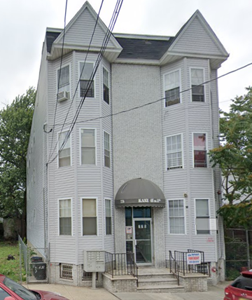Newark apartment for rent - a white building with a roof on top of it