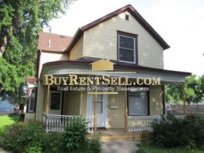 Minneapolis apartment for rent - A house with a sign that says Buy Rent Sell.