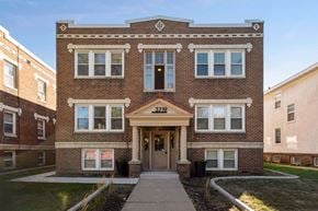 Minneapolis apartment for rent - A brick building with the number 3718 on the front.