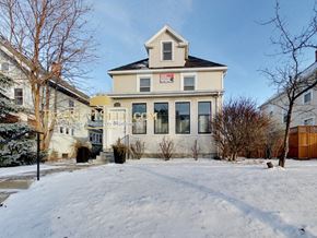 Minneapolis apartment for rent - a white house with snow on the ground