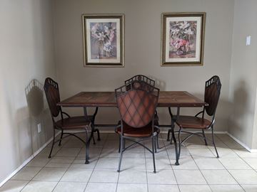 Bay City apartment for rent - A dining room with a table and chairs.
