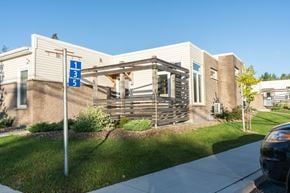 Lantz apartment for rent - the exterior of a building with a porch and a street sign