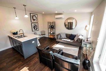 Lantz apartment for rent - an open living room with a kitchen and a couch