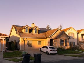Santa Maria apartment for rent - A white car is parked in front of a house.