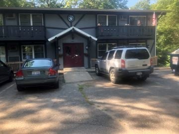 Spring Lake apartment for rent - the front of a house with cars parked in front of it