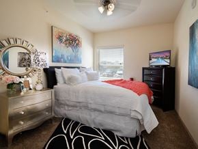 Lawrence apartment for rent - a bedroom with a bed and a window