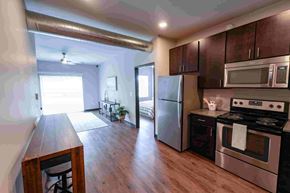 Ankeny apartment for rent - A kitchen with a stove, oven, and microwave.