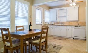 Fort Worth house for rent - A dining room with a wooden table and chairs.