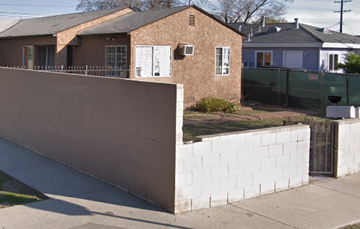 Azusa apartment for rent - a brick house with a brick wall in front of it