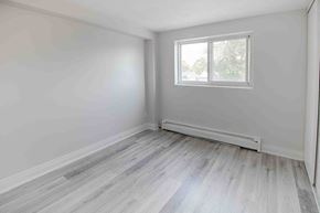 Niagara Falls apartment for rent - an empty room with white walls and a window