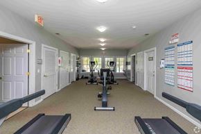 Easley apartment for rent - A gym with treadmills, weights, and exercise equipment.
