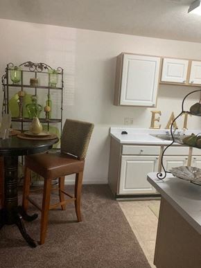 Anderson apartment for rent - A kitchen with a table and chairs.