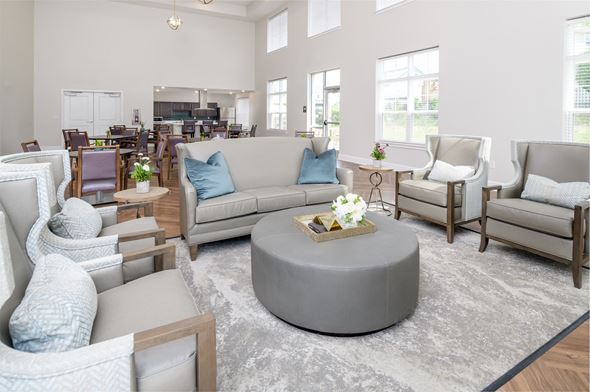 Elsmere apartment for rent - a living room with couches and chairs and a coffee table