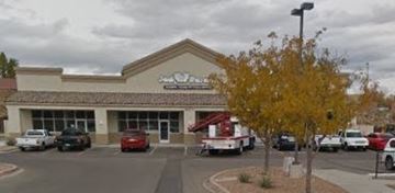 Albuquerque apartment for rent - A storefront with a tree in front of it.