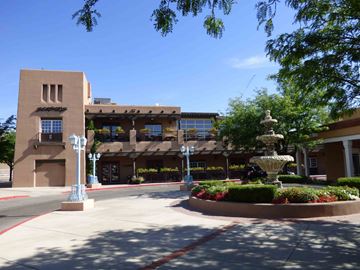 Albuquerque apartment for rent - A building with a fountain in front of it.