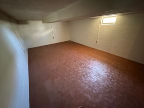Fremont apartment for rent - A room with a light on the ceiling and a window on the wall.