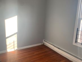 Irvington apartment for rent - the corner of a room with wooden floors and white walls
