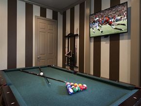 Fayetteville apartment for rent - a game room with a pool table and a tv
