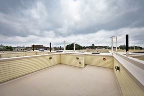 Philadelphia apartment for rent - the roof of a building with a cloudy sky in the background