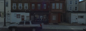 Philadelphia apartment for rent - a truck parked in front of a building on a street