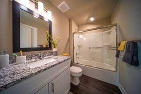 Sterling Heights apartment for rent - a bathroom with a sink toilet and a shower
