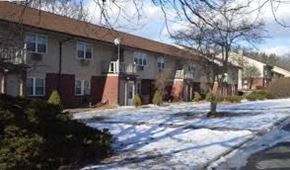 Poughkeepsie apartment for rent - an image of an apartment building in the snow