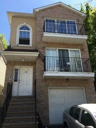 Irvington apartment for rent - a house with a car parked in front of it