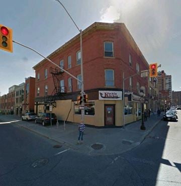 Ottawa apartment for rent - A street view of a building with a sign that reads "Kitchen".