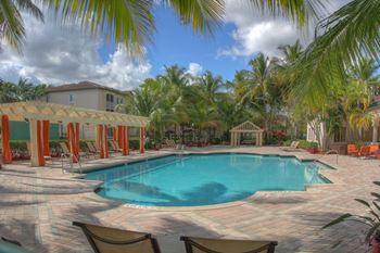 Pool oasis with private cabanas